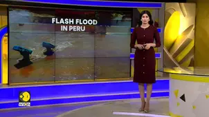 Peru's storm drain overflows, sweeping away trees