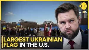 Pro-Ukraine protesters unfurl massive flag near white house