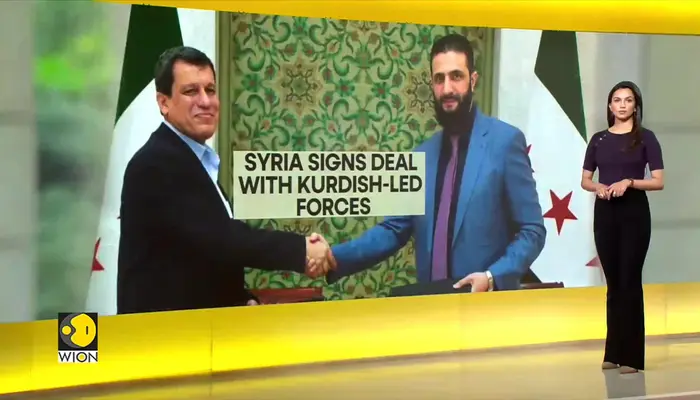 Syrian announces agreement to integrate Kurdish institutions