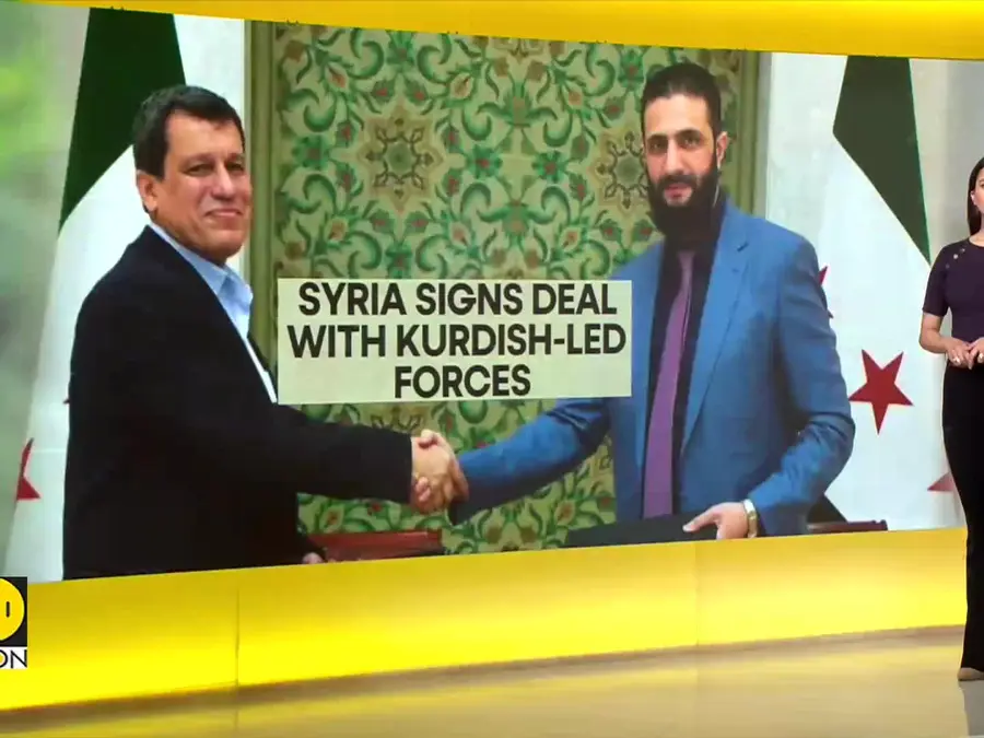 Syrian announces agreement to integrate Kurdish institutions