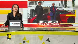 Trump buys Tesla; on White House driveway backs Elon Musk