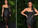 Kim Kardashian turns up as black Barbie with bows for Chanel's pre-Oscars dinner in Los Angeles