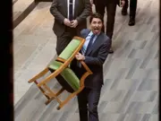 Justin Trudeau caught in playful moment with tongue sticking out as he exits Parliament