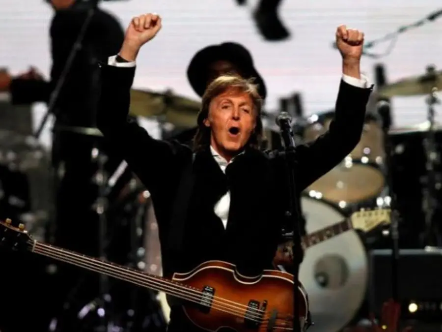The Beatles reunite! Paul McCartney and Ringo Star come together on stage in London