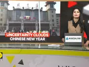 Lunar new year travellers in China face economic uncertainty