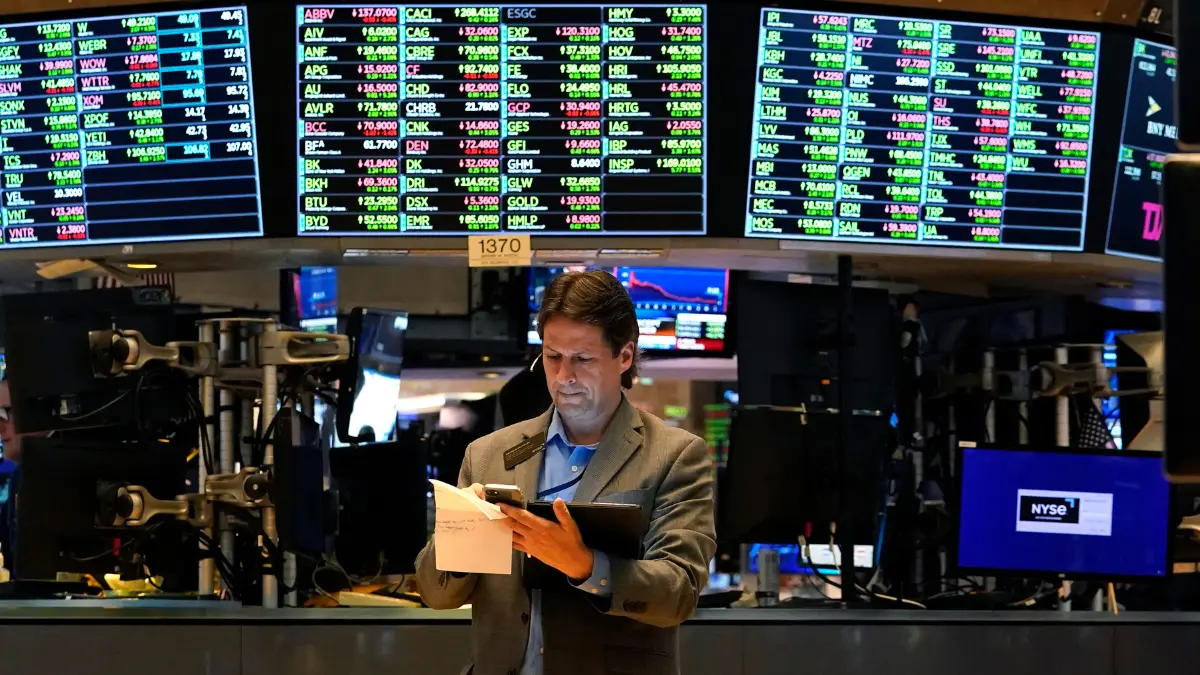 Asian markets waver as investors await central bank rate decisions