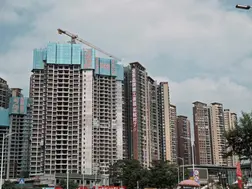 China's regulators vow to stabilise property, stock markets