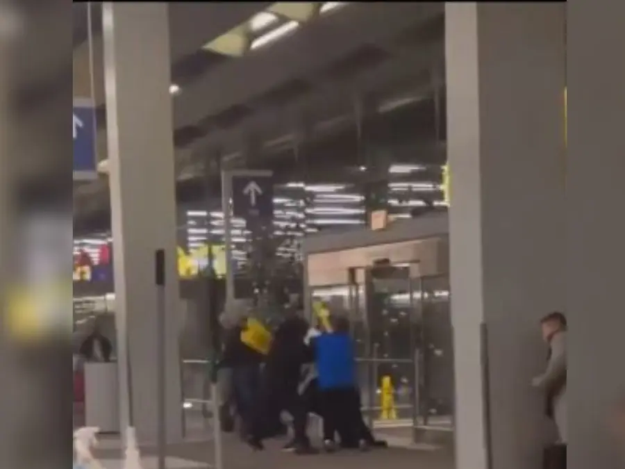 Watch: 'WWE fight' among four men at Chicago airport with 'wet floor' sign boards