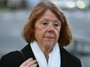 Gisèle Pelicot and her scarf: Some days a shield, other days a hug