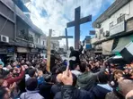 Hundreds hit the streets as protest erupts over burning of Christmas tree near Syria's Hama