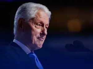 Bill Clinton discharged from hospital after flu treatment, expected to return home before Christmas