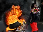 Twenty-one killed in unrest after Mozambique's top court confirms Frelimo's election victory
