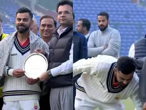 Watch: Virat comes up with heart-warming gesture, touches feet of childhood coach Rajkumar Sharma during felicitation