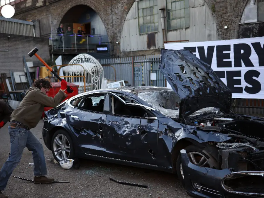 'Everyone Hates Elon' group smashes Tesla car in London protest; pics here