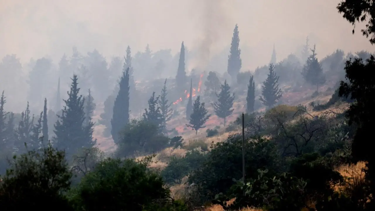 Wildfires rage for a second day