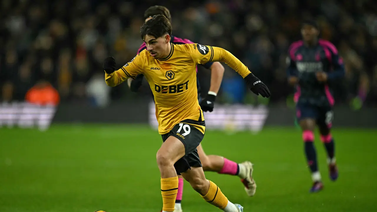 Premier League: Nottingham Forest tame Wolves to maintain unlikely title challenge