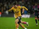 Premier League: Nottingham Forest tame Wolves to maintain unlikely title challenge
