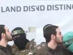 Stockholm Syndrome? Israeli hostage seen kissing Hamas militants on head after release. Watch video