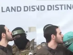 Stockholm Syndrome? Israeli hostage seen kissing Hamas militants on head after release. Watch video