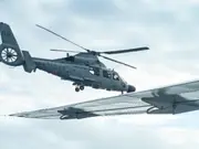 South China Sea: Chinese helicopter flew 'dangerously' within 3m of Philippine plane