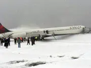Déjà vu? Delta plane crash bears eerie similarity to a 2015 incident. See pics
