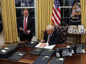 Global stock markets surge as Trump resumes office; Oil prices decline