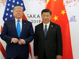 China vows to defend its 'national interests' after Trump threatens with 10 per cent tariffs