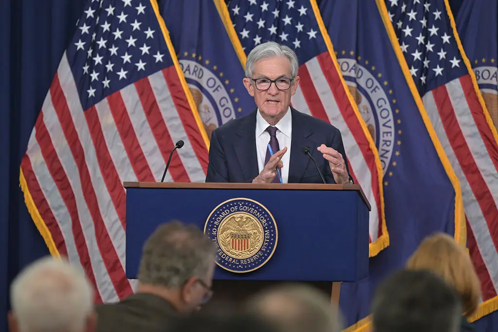 US Federal Reserve holds key rates amid tariff-driven uncertainties, warns against inflation