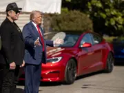 WATCH: Trump buys new Tesla, says didn't ask Musk for discount; 'Get in, patriots'