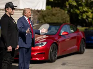WATCH: Trump buys new Tesla, says didn't ask Musk for discount; 'Get in, patriots'