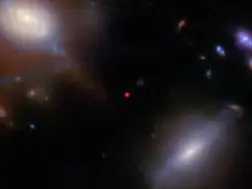 13-billion-year-old galaxy mysteriously crosses a cosmic veil to reach Webb