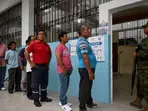 Ecuador votes in razor-close presidential election