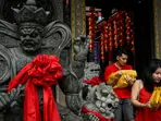 Prayer and dance: Hundreds of millions in Asia celebrate Year of the Snake
