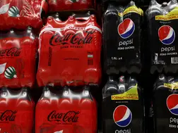 Cold drink giants campaign war: Pepsi takes jab at Coca-Cola's 'half time' campaign with its 'any time' ad