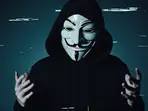 'This isn't paranoia': Anonymous claims Trump and Putin are in a 'love fest'