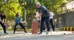 Bowled over by cricket! NZ PM Christopher Luxon plays gully cricket in India with Kapil Dev, Ross Taylor & Ajaz Patel