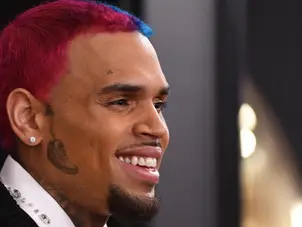 US singer Chris Brown charged with assault in Britain