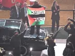 Protester crashes Kendrick Lamar’s Super Bowl performance with Palestinian flag bearing words 'Gaza', 'Sudan'