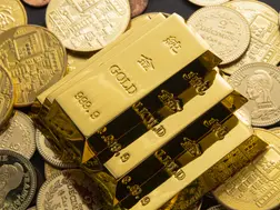 Gold price hits record, stocks mixed as Trump fuels Fed fears