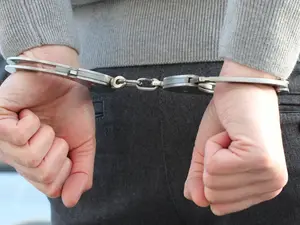 Three Iranians charged with suspected espionage in UK