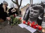 ‘The whole world knows who ordered it': Russians risk arrest to honour Alexei Navalny's memory