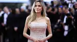 Angelina Jolie is a vision in white as she walks red carpet as Cannes Godmother