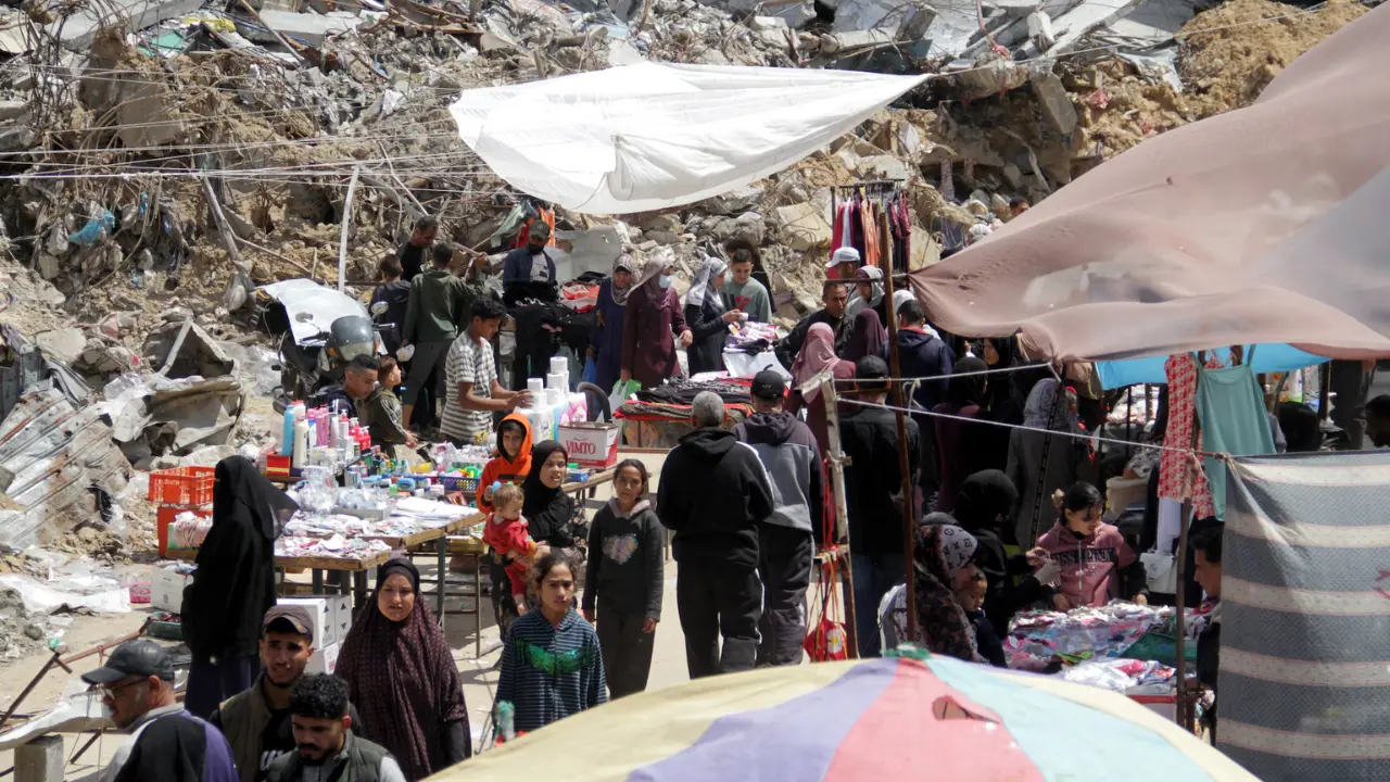 Eid in Gaza amid food shortages and outrage over the killing of eight medics