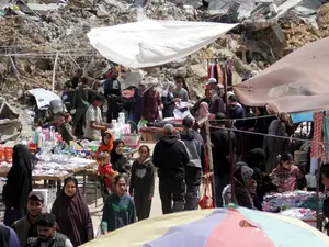 Eid in Gaza amid food shortages and outrage over the killing of eight medics