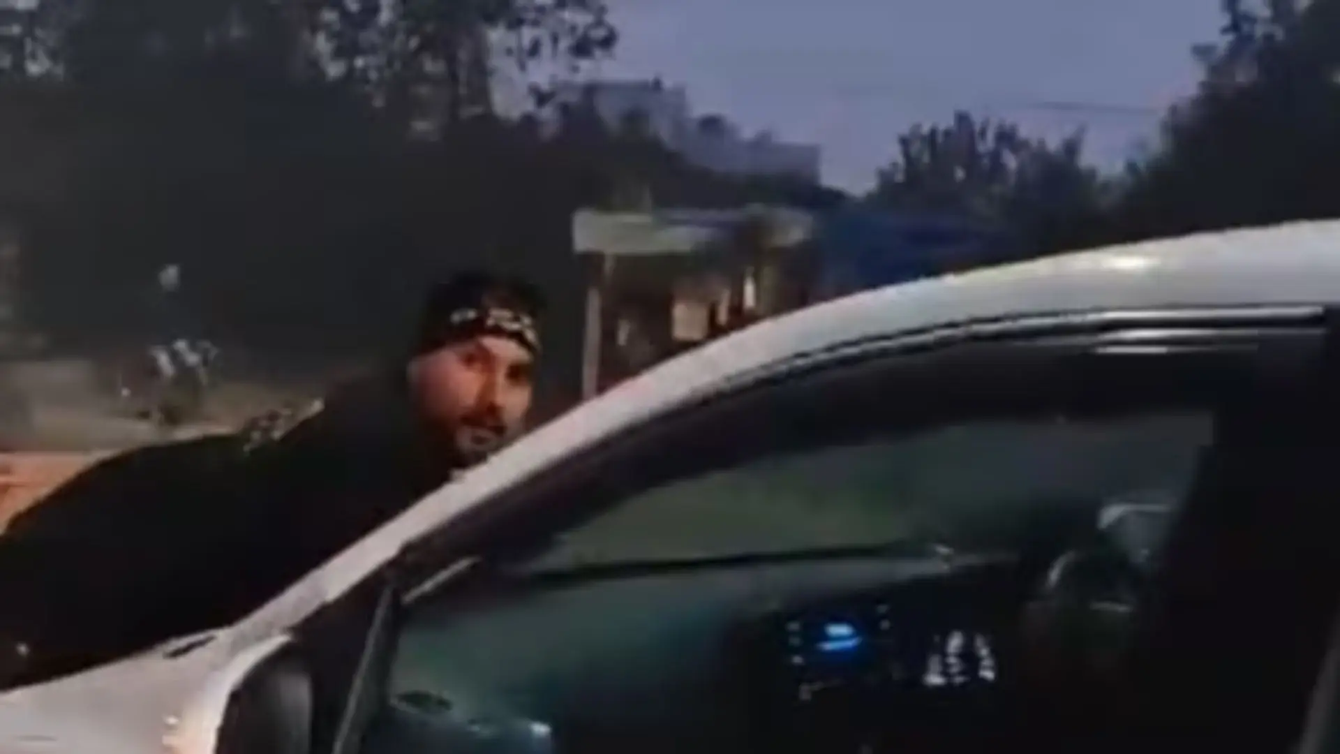 Watch: Wife’s lover cruises car down busy road with husband clinging to bonnet