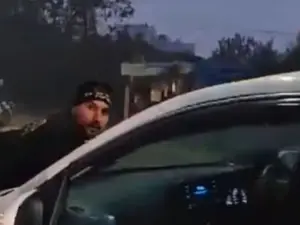 Watch: Wife’s lover cruises car down busy road with husband clinging to bonnet