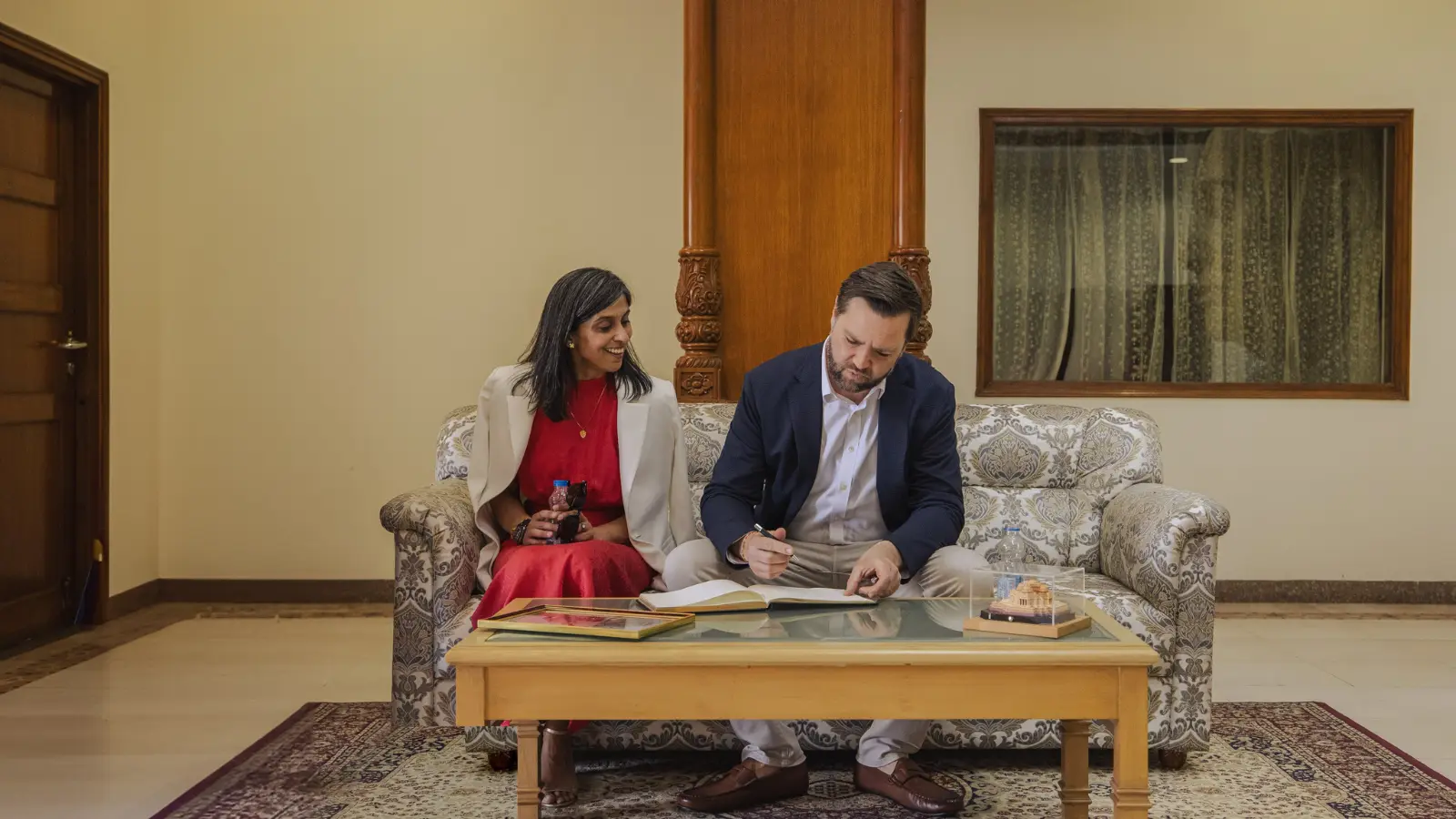 JD Vance accompanied by Usha Vance 