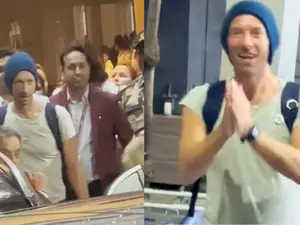 Coldplay in India! Chris Martin arrives in Mumbai, greets paps with a namaste | Watch