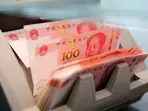 China's record capital outflows pile pressure on yuan