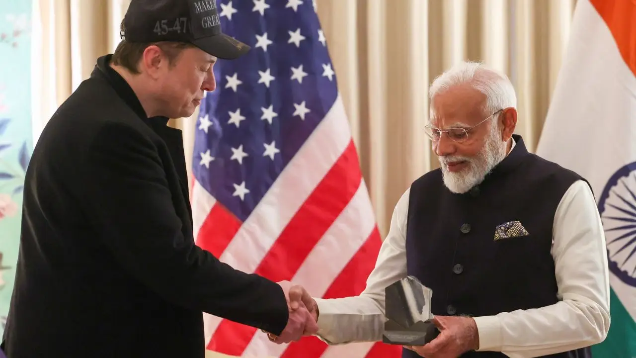 SpaceX CEO Elon Musk presents a special gift to Indian PM Narendra Modi